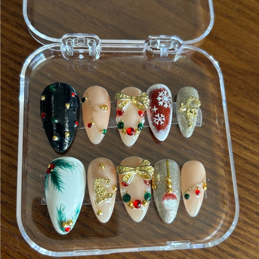 Festive Nail Art Set with Gold and Red Accents